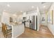 Modern kitchen with stainless steel appliances and granite countertops at 1206 Brooks Ryan Run(Lot 102), Lawrenceville, GA 30043