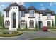 Grand two-story house with a circular driveway at 1811 Trinidad, Stockbridge, GA 30281