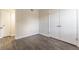 Spacious bedroom with wood-look floors and double door closet at 105 Adrian Dr, Stockbridge, GA 30281