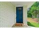 Bright blue front door entry with a decorative glass window at 679 Forest Ridge Se Dr, Marietta, GA 30067