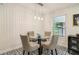 Small dining area with a glass-top table and four chairs at 679 Forest Ridge Se Dr, Marietta, GA 30067