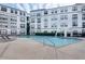 Refreshing community pool with lounge chairs and building view at 821 Ralph Mcgill Ne Blvd # 3313, Atlanta, GA 30306