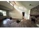 Large living room with stone fireplace and high ceilings at 445 Independence Dr, Jonesboro, GA 30238