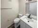 Updated bathroom with quartz vanity and wood-look floor at 6383 Wedgewood Trce, Tucker, GA 30084