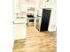 Modern kitchen with stainless steel appliances and white cabinets at 4701 Flat Shoals Rd # 68D, Union City, GA 30291