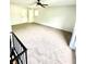 Spacious loft area with neutral carpet and ceiling fan at 4701 Flat Shoals Rd # 68D, Union City, GA 30291