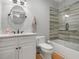 Bathroom with white vanity, bathtub, and modern tile at 3920 Drew Campground Rd, Cumming, GA 30040