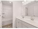 Bathroom with a double vanity and bathtub at 1718 Lacebark Elm Way, Lawrenceville, GA 30045