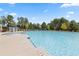 Resort-style swimming pool with a water feature at 1718 Lacebark Elm Way, Lawrenceville, GA 30045