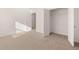 Bright bedroom with carpet flooring and spacious closet at 1718 Lacebark Elm Way, Lawrenceville, GA 30045