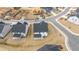 Aerial view of homes and streets in a new development at 1718 Lacebark Elm Way, Lawrenceville, GA 30045