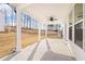 Covered patio with ceiling fan and view of backyard at 1718 Lacebark Elm Way, Lawrenceville, GA 30045