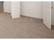 Spacious bedroom with neutral carpet and doors to closet at 1718 Lacebark Elm Way, Lawrenceville, GA 30045