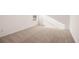 Bright bedroom featuring neutral carpet and natural light at 1718 Lacebark Elm Way, Lawrenceville, GA 30045