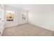 Simple bedroom with neutral wall and carpet at 1718 Lacebark Elm Way, Lawrenceville, GA 30045