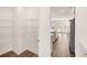 Bright walk-in pantry with wire shelving; view into kitchen at 1718 Lacebark Elm Way, Lawrenceville, GA 30045