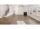 Spacious Gathering room with fireplace and hardwood floors at 1718 Lacebark Elm Way, Lawrenceville, GA 30045