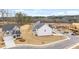 Aerial view of homes and streets in a new development at 1718 Lacebark Elm Way, Lawrenceville, GA 30045