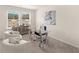 Bright home office with two armchairs and a glass desk at 6375 Rosetta Dr # 86, South Fulton, GA 30331