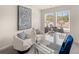 Modern home office featuring glass desk and natural light at 6375 Rosetta Dr # 86, South Fulton, GA 30331