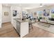 Open floor plan boasting a modern kitchen island and spacious living area at 6375 Rosetta Dr # 86, South Fulton, GA 30331