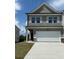 Two-story townhome with attached garage at 6375 Rosetta Dr # 86, South Fulton, GA 30331