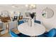 Bright dining area with marble table and blue chairs at 6375 Rosetta Dr # 86, South Fulton, GA 30331