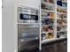 Modern kitchen with built-in microwave and drawers at 2880 Bakers Farm Se Rd, Atlanta, GA 30339