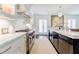 Bright kitchen features marble countertops, high-end appliances, and ample cabinetry at 2880 Bakers Farm Se Rd, Atlanta, GA 30339