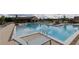 Large community pool with plenty of lounge chairs at 709 Dodd Ln # 165, Buford, GA 30518