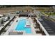 Aerial view of resort-style pool, deck, and community clubhouse at 709 Dodd Ln # 165, Buford, GA 30518