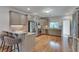 Modern kitchen with stainless steel appliances and hardwood floors at 114 Trinity Hollow Dr, Canton, GA 30115