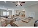 Open concept dining area with hardwood floors and a view into the kitchen at 114 Trinity Hollow Dr, Canton, GA 30115