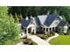 Aerial view of house, driveway, and landscaping at 114 Trinity Hollow Dr, Canton, GA 30115