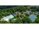 Community tennis courts nestled in trees at 205 Lakeside Pl, Canton, GA 30114