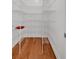 Walk-in pantry with ample shelving for storage at 205 Lakeside Pl, Canton, GA 30114