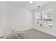 Bright home office features a white desk and large window at 205 Lakeside Pl, Canton, GA 30114