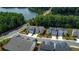 Aerial view of homes near a lake at 205 Lakeside Pl, Canton, GA 30114