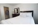 Bright bedroom with walk-in closet and dresser at 205 Lakeside Pl, Canton, GA 30114