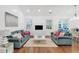 Spacious living room with hardwood floors and two comfy sofas at 205 Lakeside Pl, Canton, GA 30114