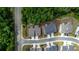 Aerial view of homes and community features at 205 Lakeside Pl, Canton, GA 30114