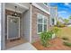 Inviting front entrance with gray door and stone accents at 205 Lakeside Pl, Canton, GA 30114