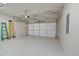 Garage with overhead storage and epoxy floor at 205 Lakeside Pl, Canton, GA 30114