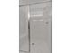 Modern shower with marble walls and a built-in bench seat at 205 Lakeside Pl, Canton, GA 30114