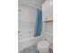 Clean bathroom with a shower/tub and white tile at 205 Lakeside Pl, Canton, GA 30114