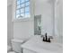 Bathroom with white vanity and black fixtures at 1284 Six Sisters St, Dacula, GA 30019