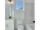 Bathroom with white vanity, tub, and tile at 1284 Six Sisters St, Dacula, GA 30019