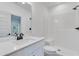 Clean bathroom with white subway tiles, a shower, and a white vanity at 1284 Six Sisters St, Dacula, GA 30019