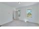 Bedroom with access to porch and neutral carpeting at 1284 Six Sisters St, Dacula, GA 30019