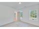 Bright bedroom with neutral carpeting and large windows at 1284 Six Sisters St, Dacula, GA 30019